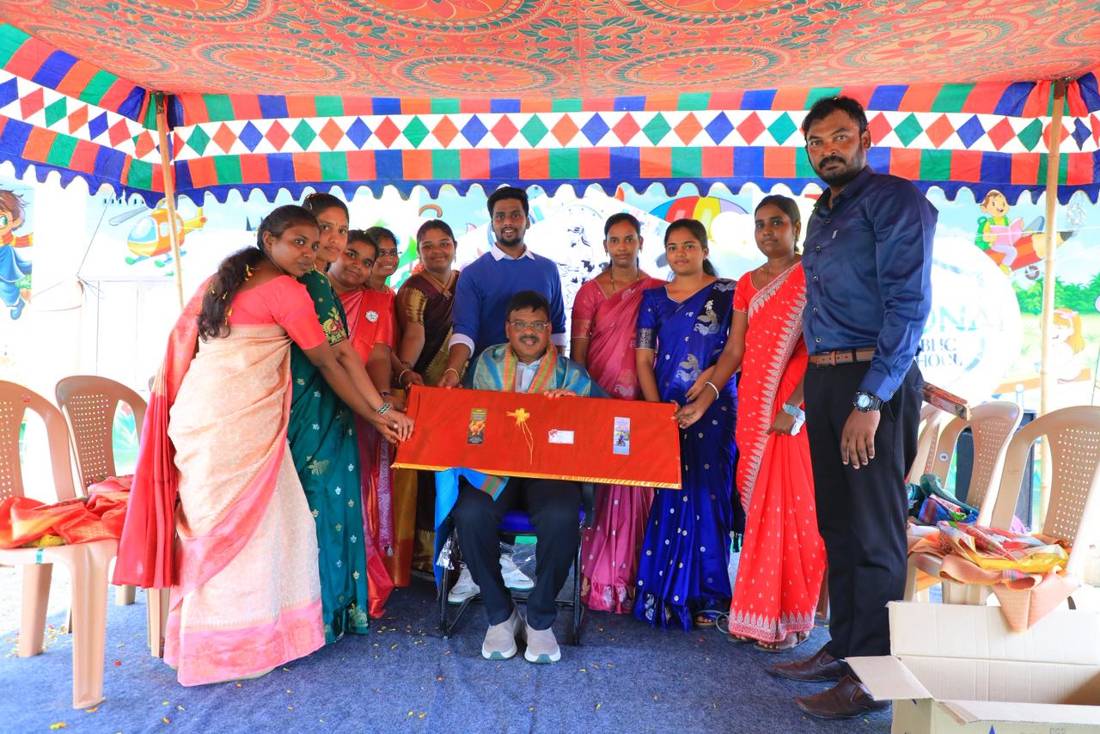 Teacher's Day gathering under a decorated canopy